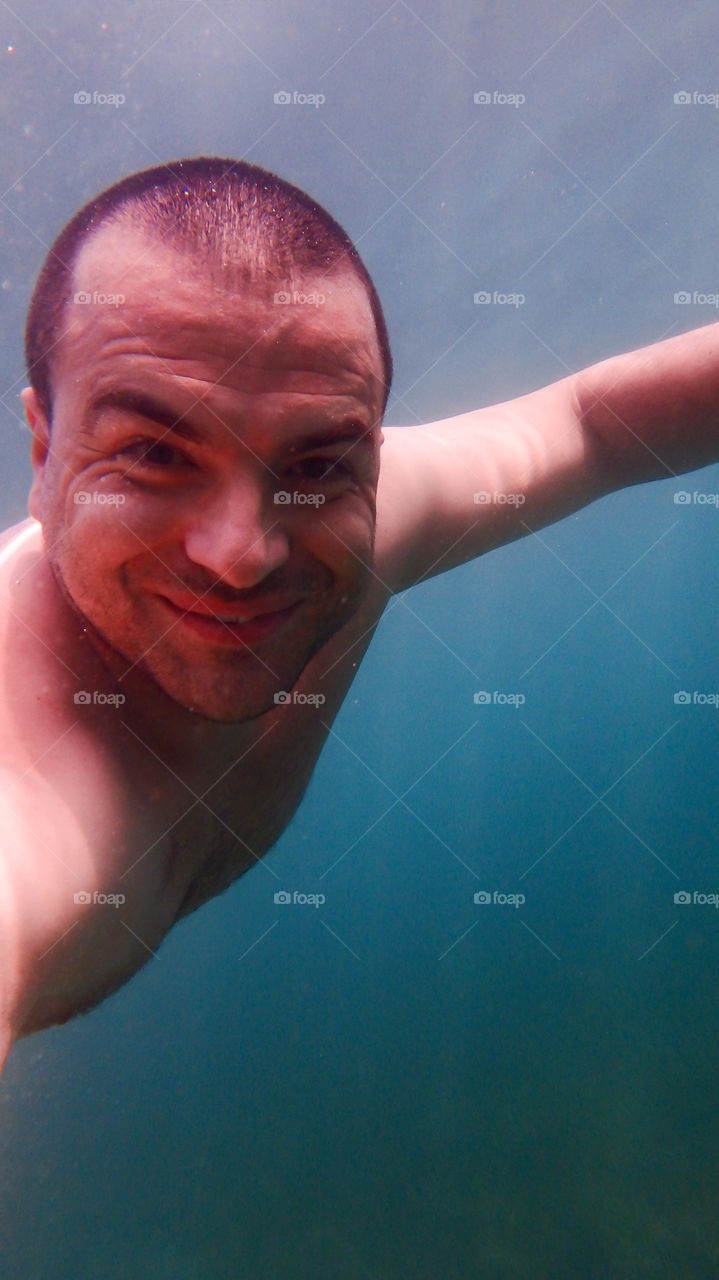 Man enjoying in underwater