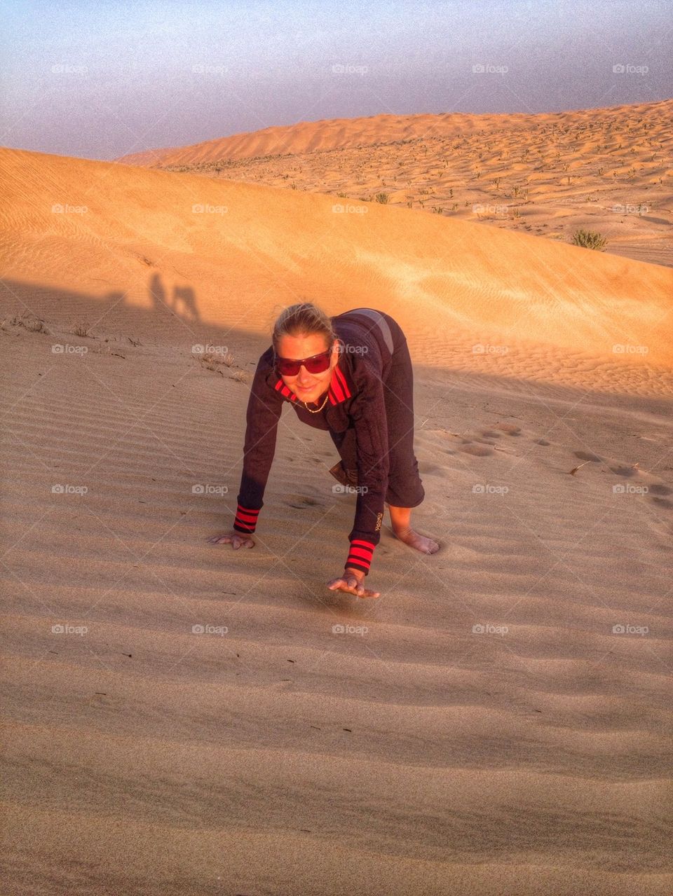 Hiking the sand dunes in Oman