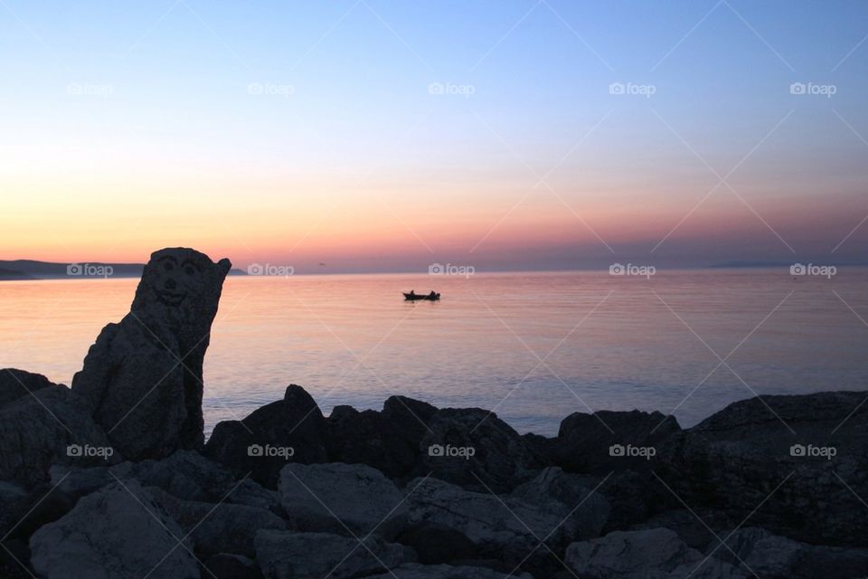 Sunset and fishermen