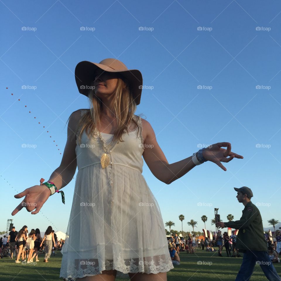 Dancing in the grass. What one does at Coachella 