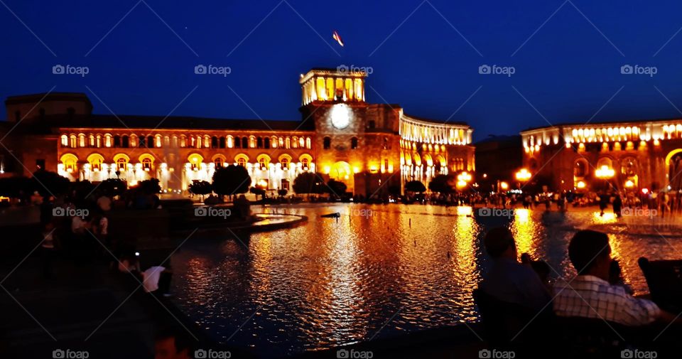 Yerevan square under evening lights
