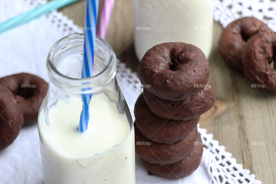 Chocolate donuts and milk