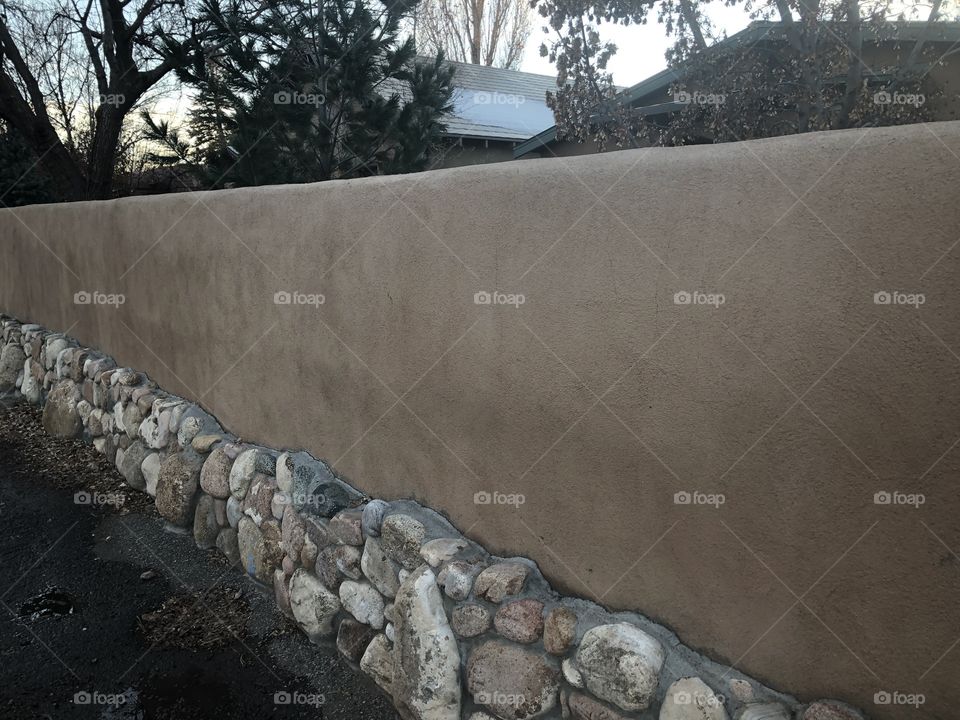 Adobe and Stone Fence