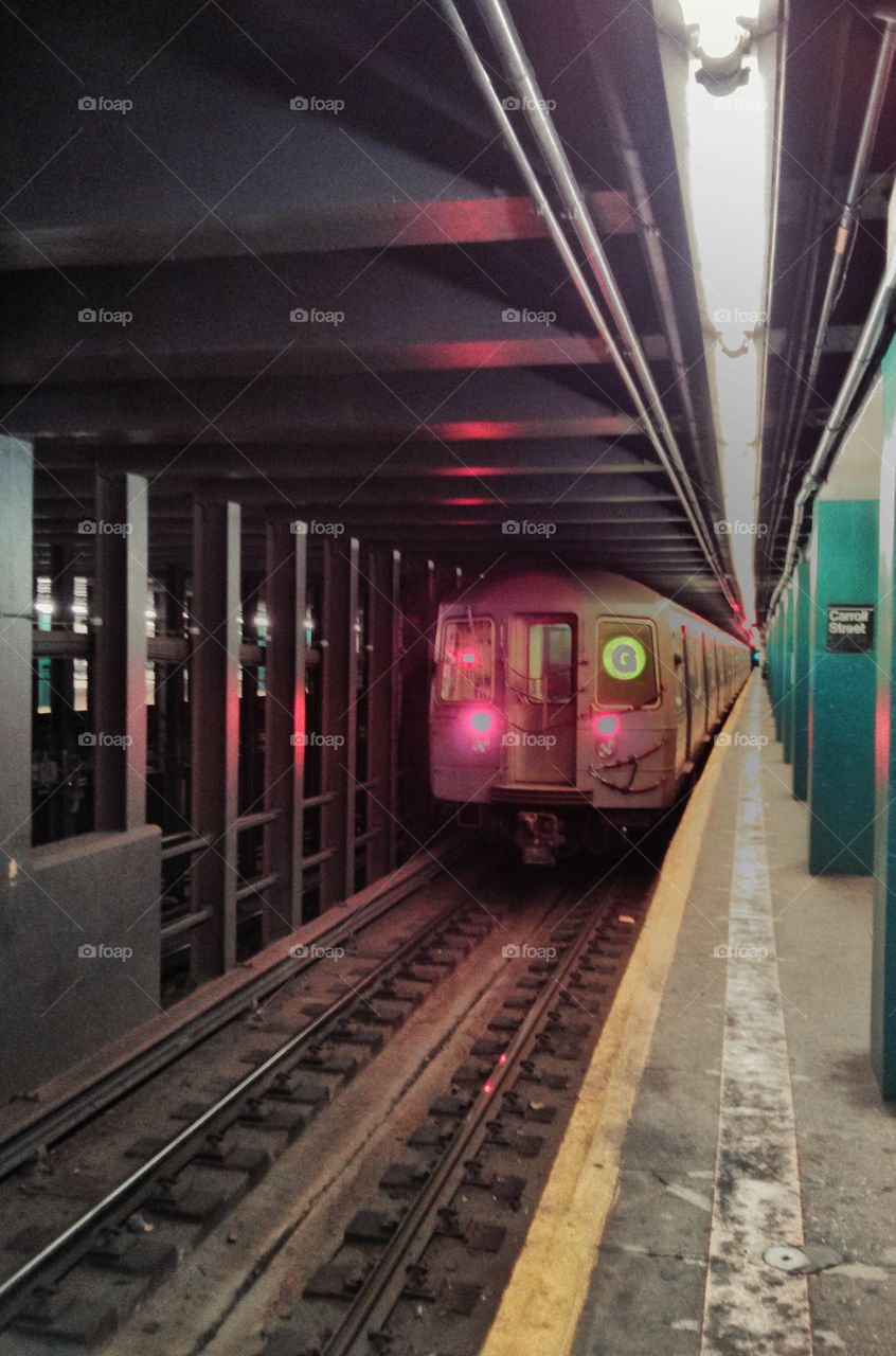 NYC Subway "G" Train. Subway pulling into Carroll Street subway station