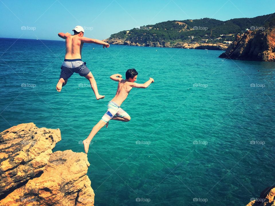 Jumping off a cliff in Barcelona. 