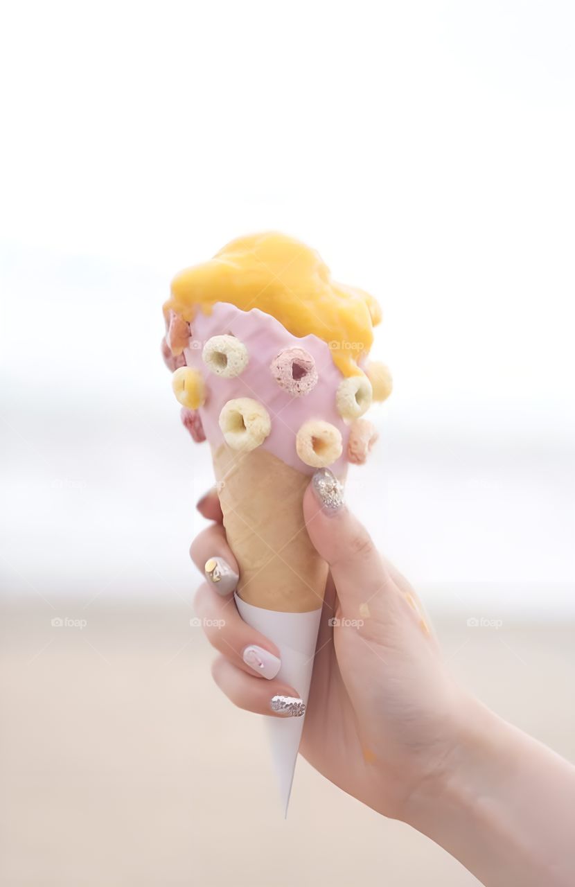rainbow mango ice cream on beach