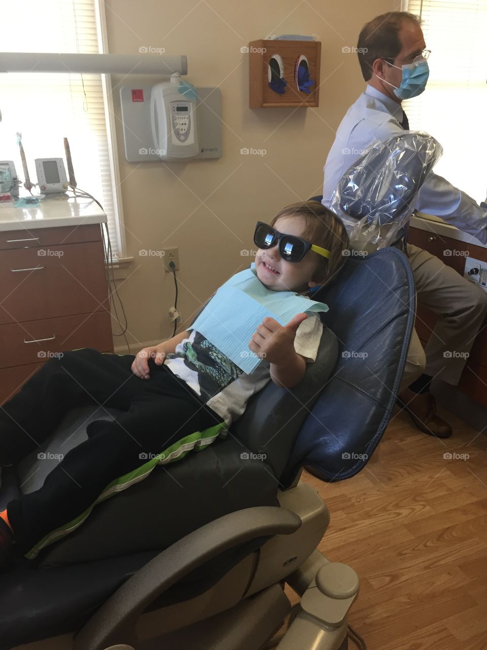 Small boy smiling in dental office