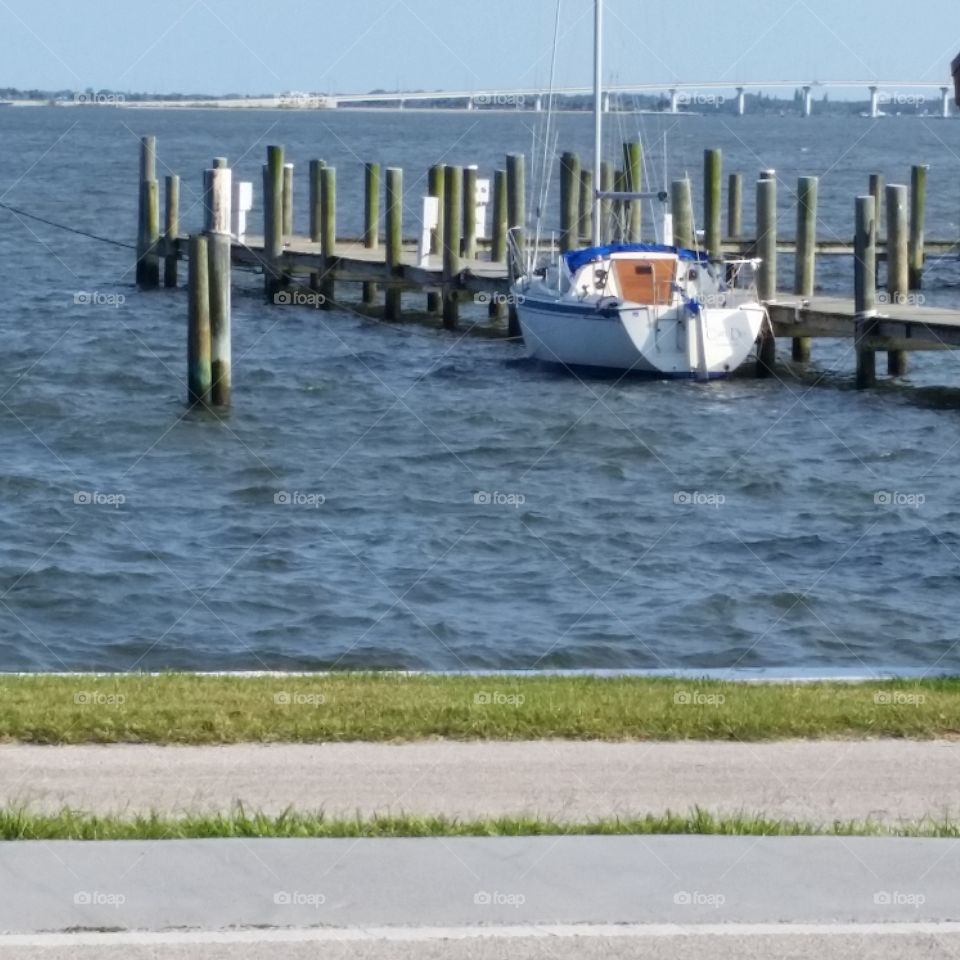 Docks. Sailboat docked