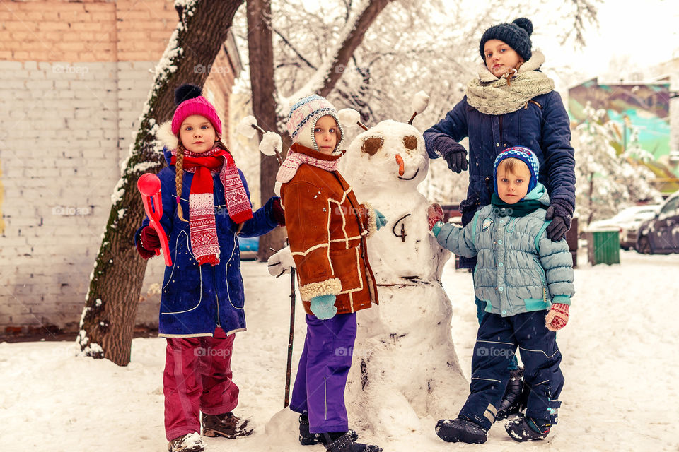 Family with snowman