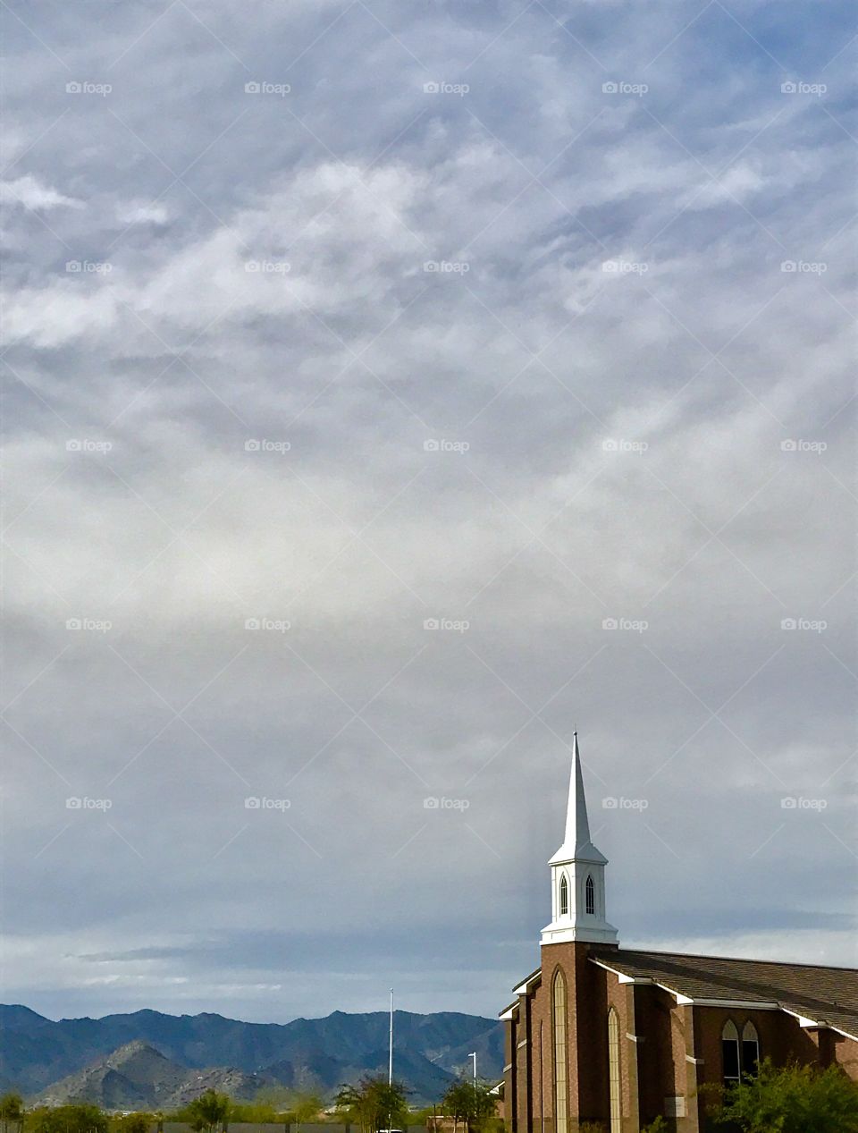 Church Steeple with Mountains