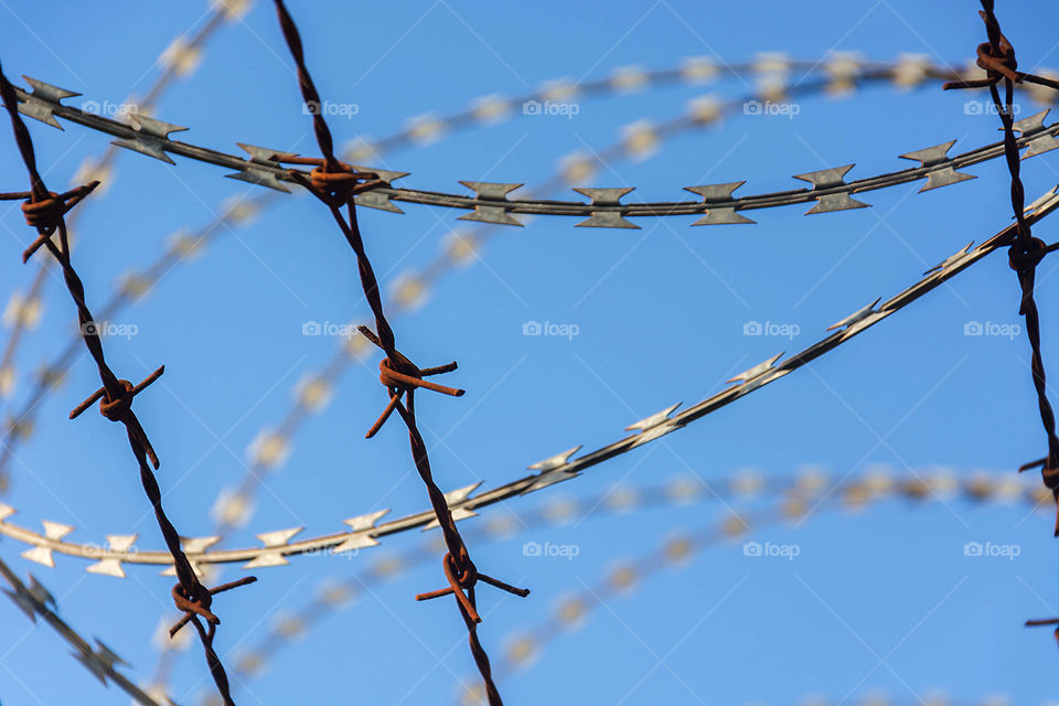 Barbed wire fence used for protection purposes of property and lmprisonment