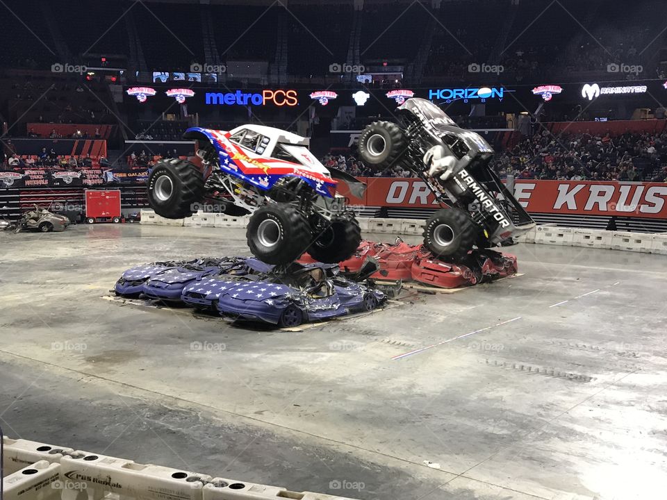 Monster truck jumping cars