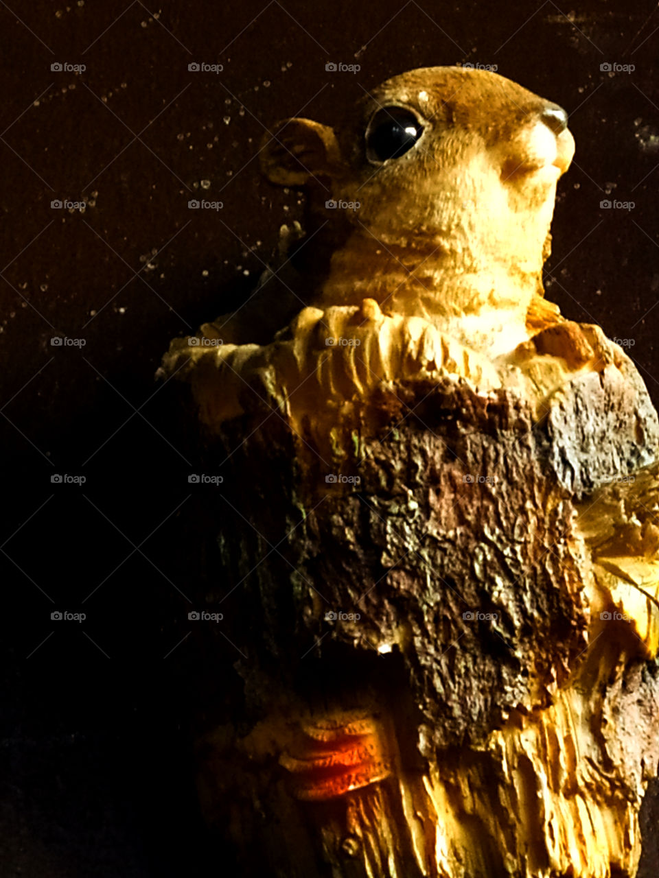 Toy: gopher peeking out of a tree