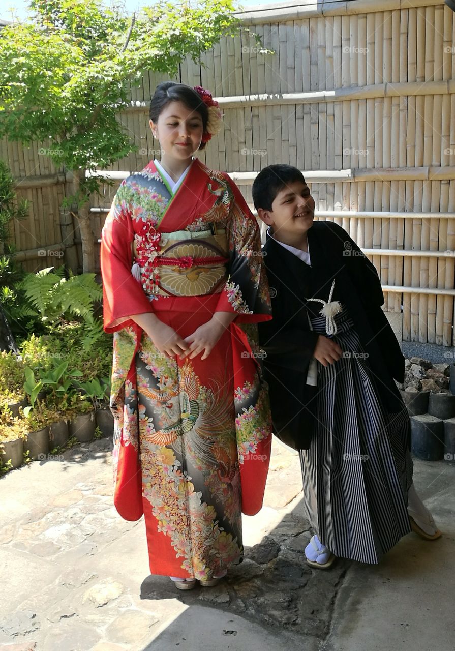 girl and child wearing kimono