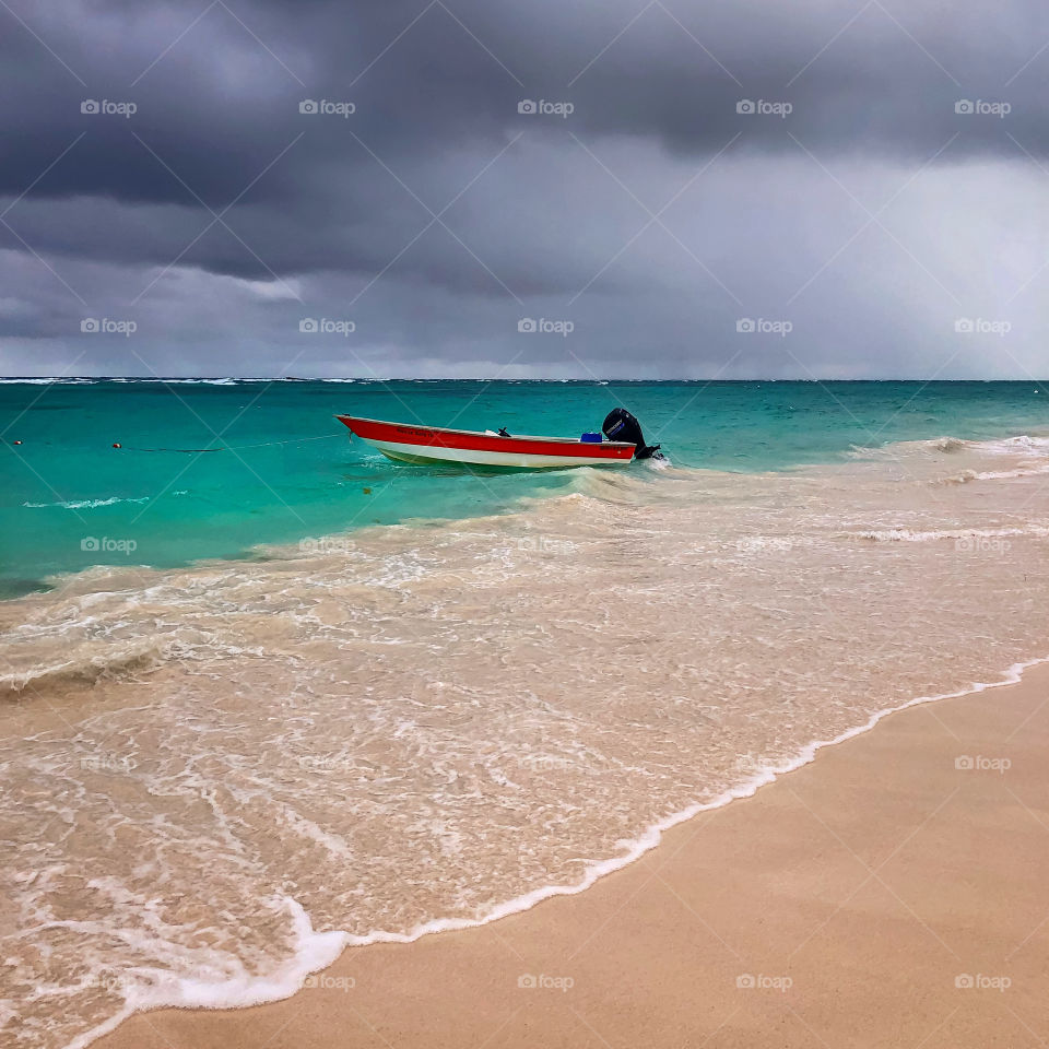 Beach and boat near the ocean