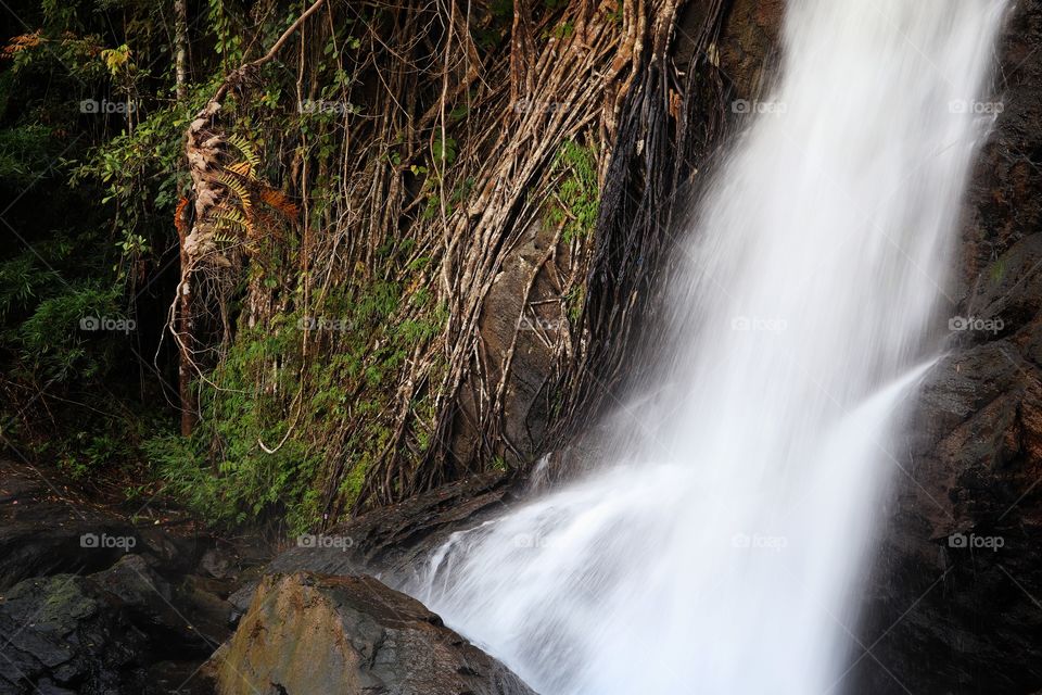 Silky waterfall through the rocks