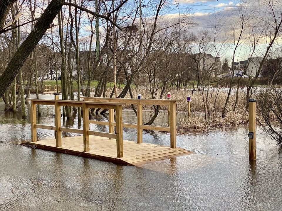 Flooding in a neighborhood after heavy rains following a summer drought