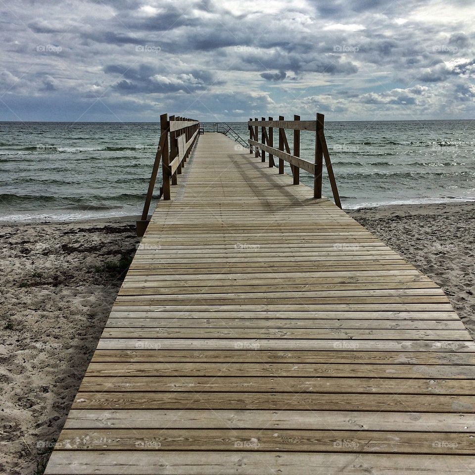 Empty pier on sea