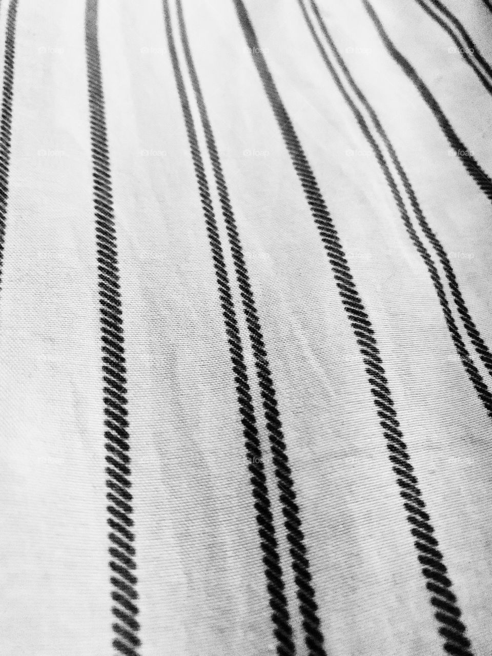 Textures and materials - lines on a piece of fabric, cloth fabric stripes with patterns and shapes  