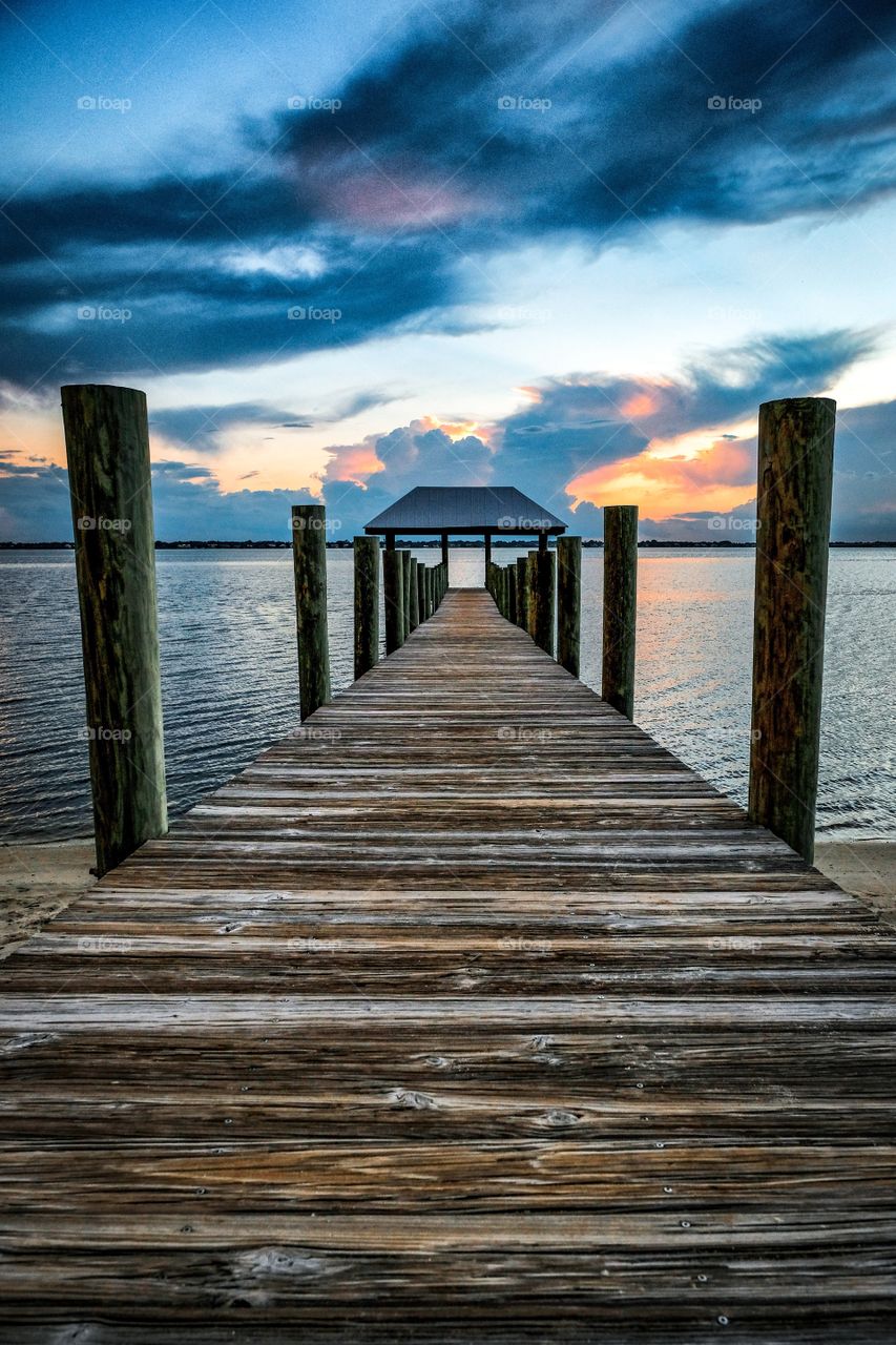 Looking down low angle on a dock during a South Florida sunset.