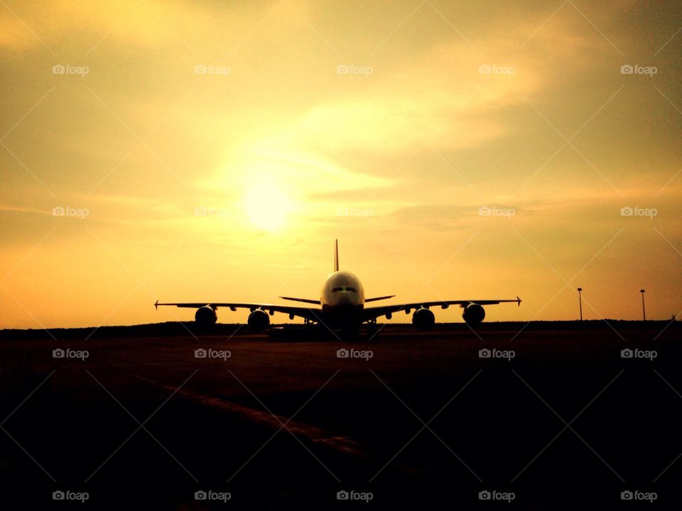 Airplane landing at the airport runway