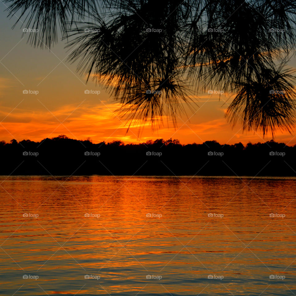 Dramatic sky over calm lake