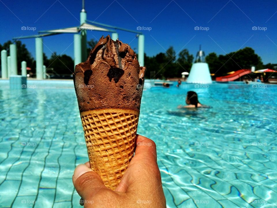 Eating ice cream at the pool on a hot summer day