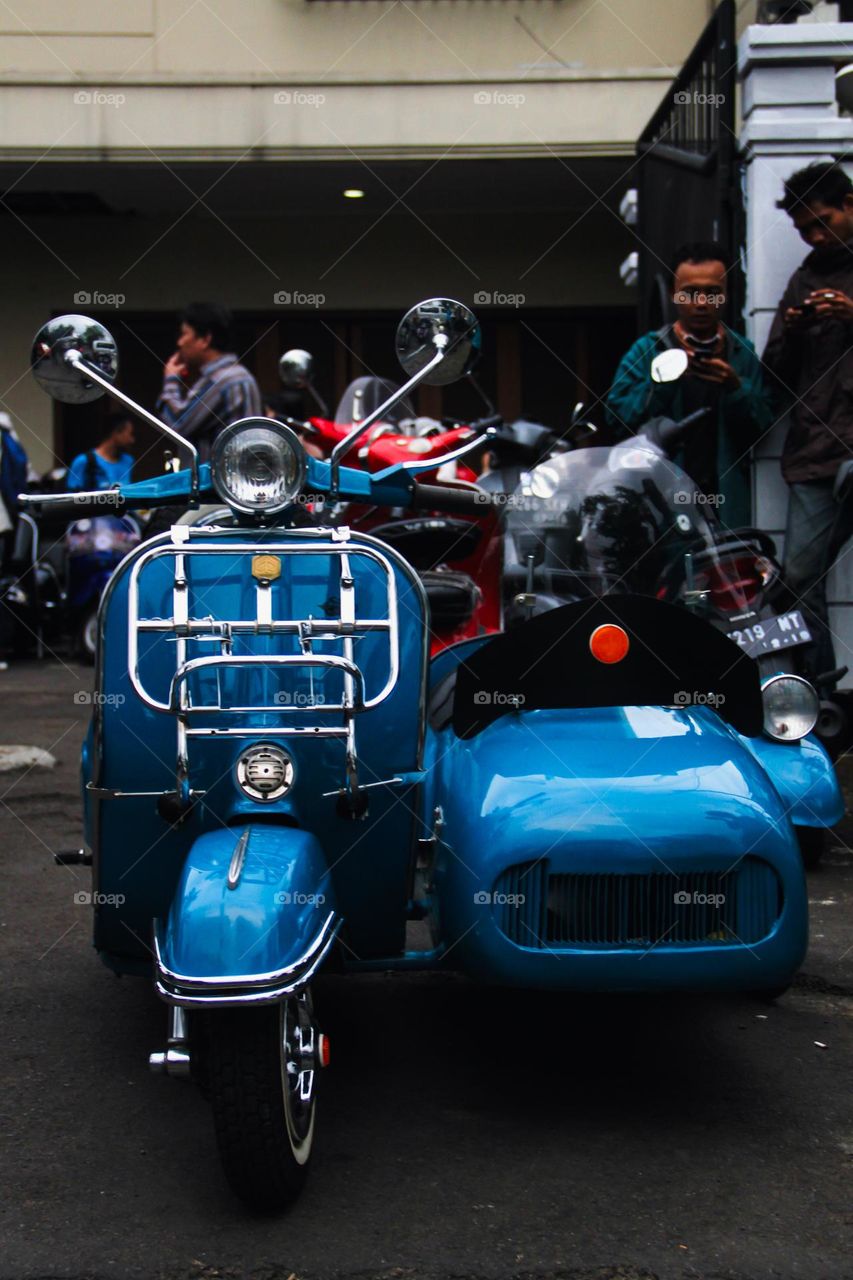 dazzling blue vespa.