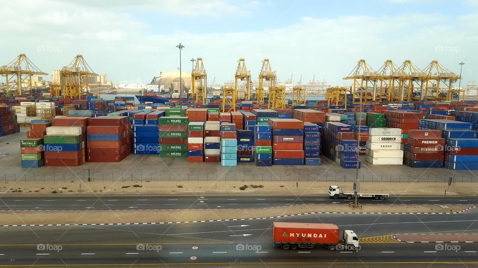 Containers and cranes at Jebel Ali port, Dubai, UAE