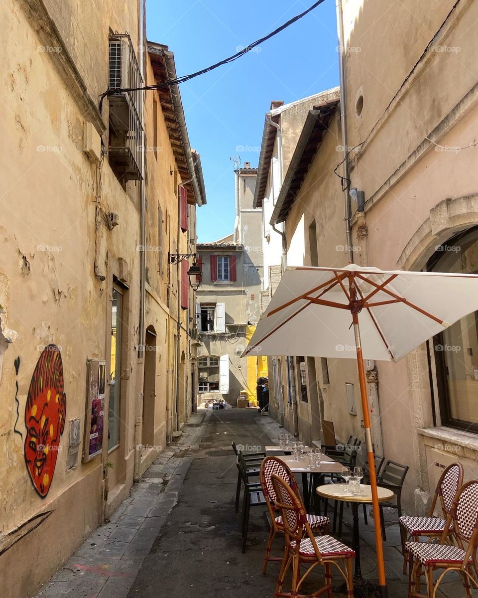 Narrow street in Arles in Camargue 