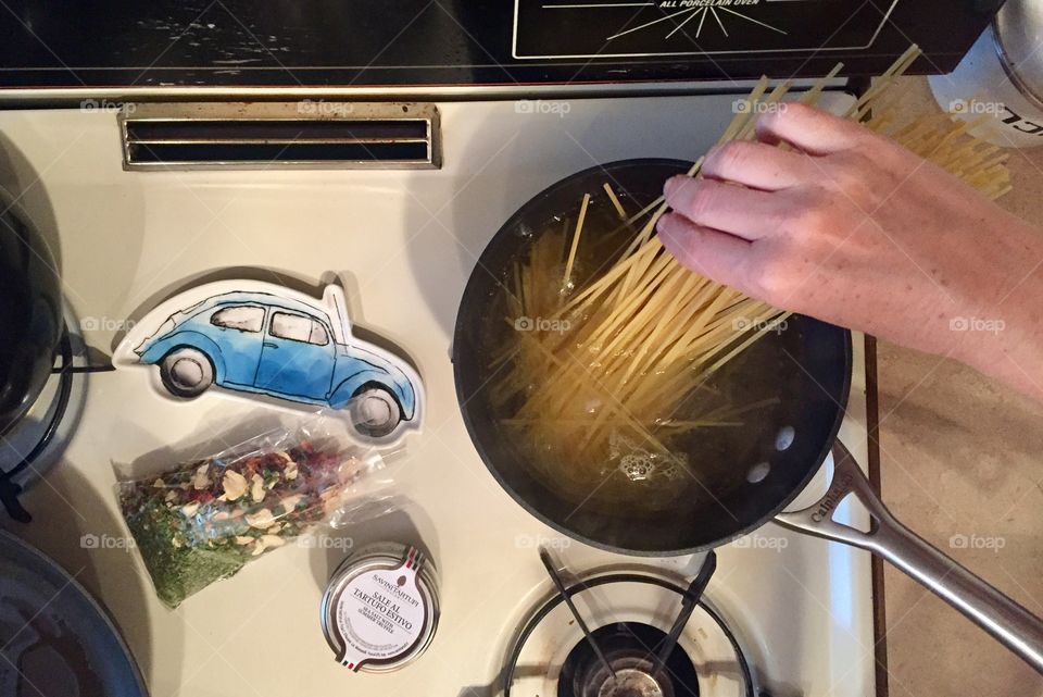 Hand cooking pasta