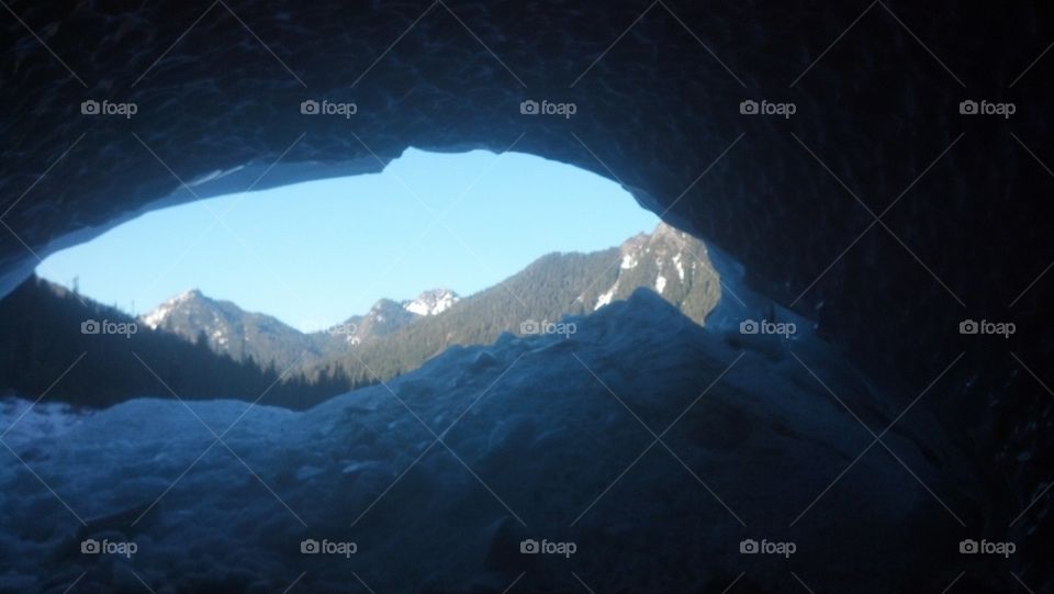 view of the mountains from inside of a snow cave in Snohomish County Washington United States of America 2015