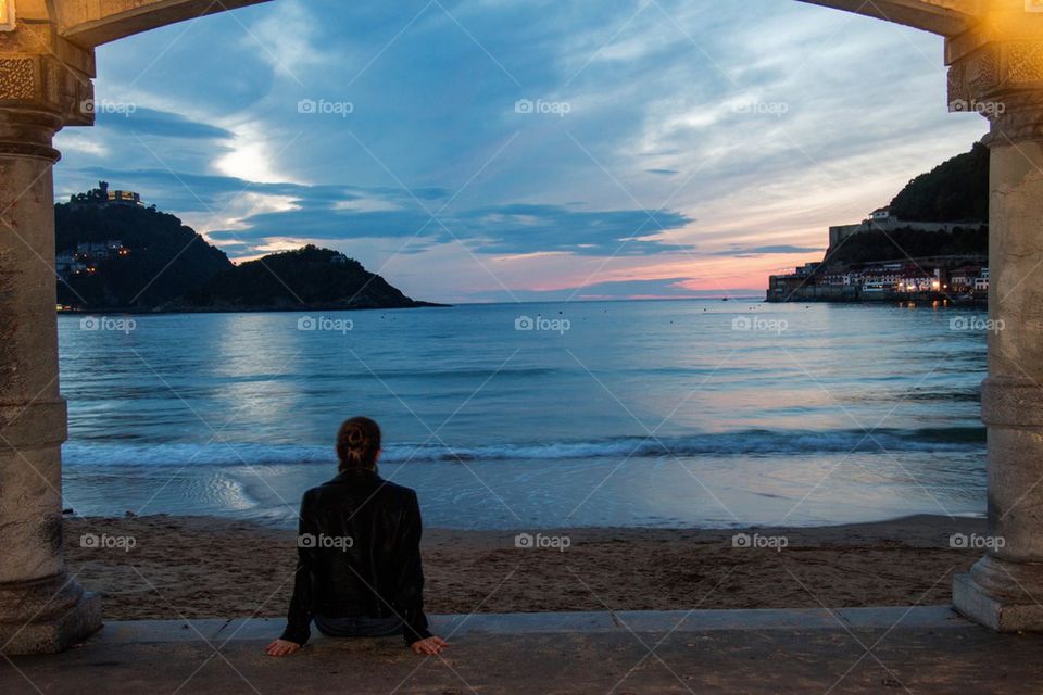 Woman watching the sunset 