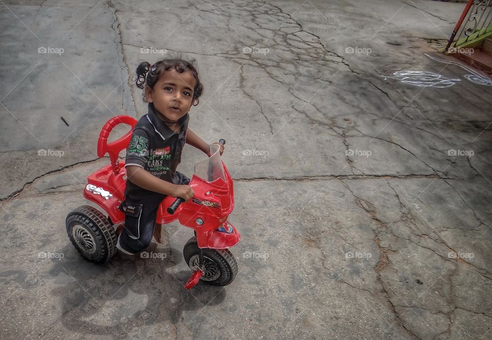 My first bike. A baby enjoying the bike ride