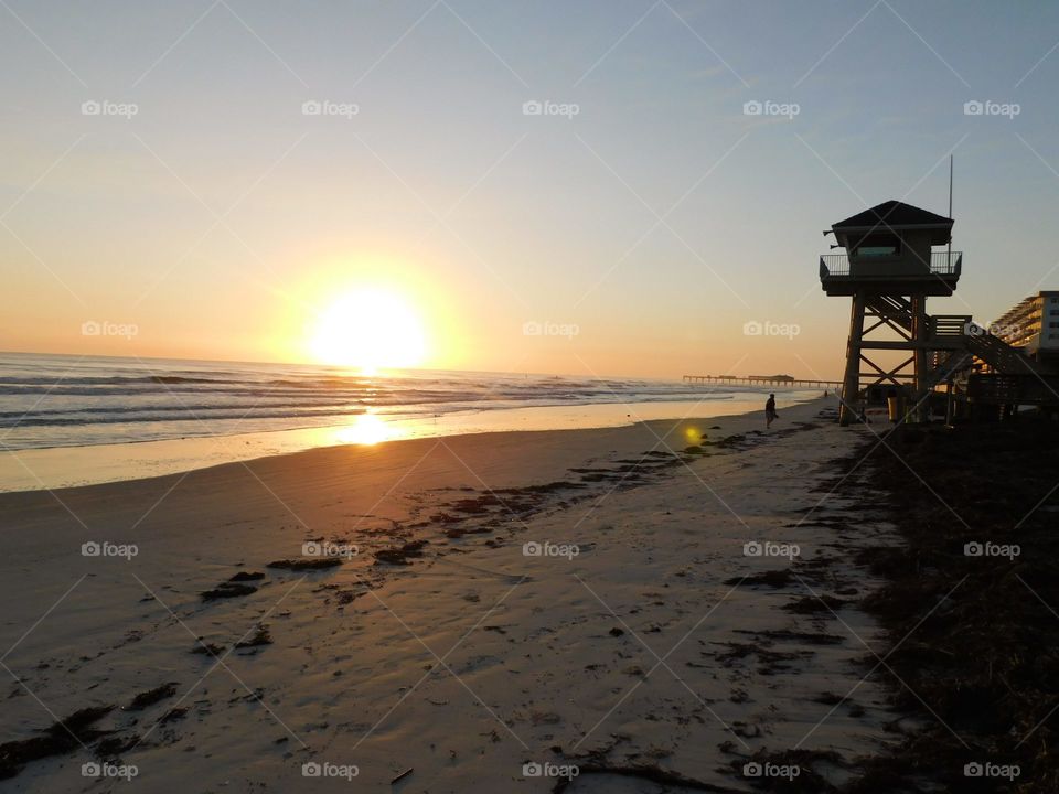 sunrise on the beach, watch tower