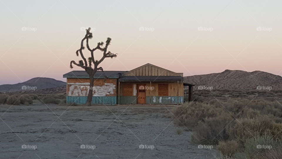 Abandoned desert building at twilight