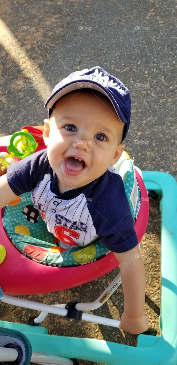 Showing his sweet smile