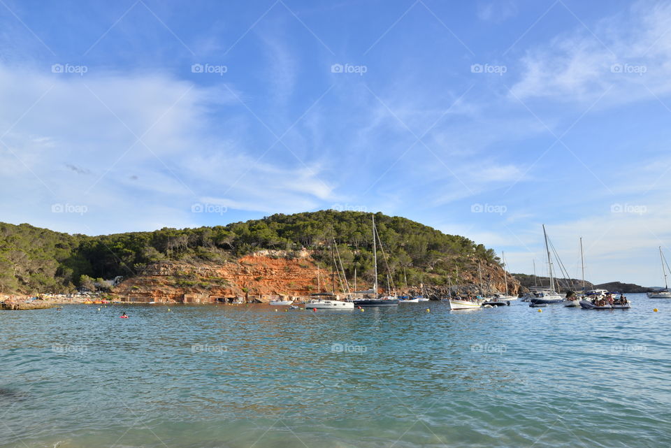 Boats moored at ibiza sea