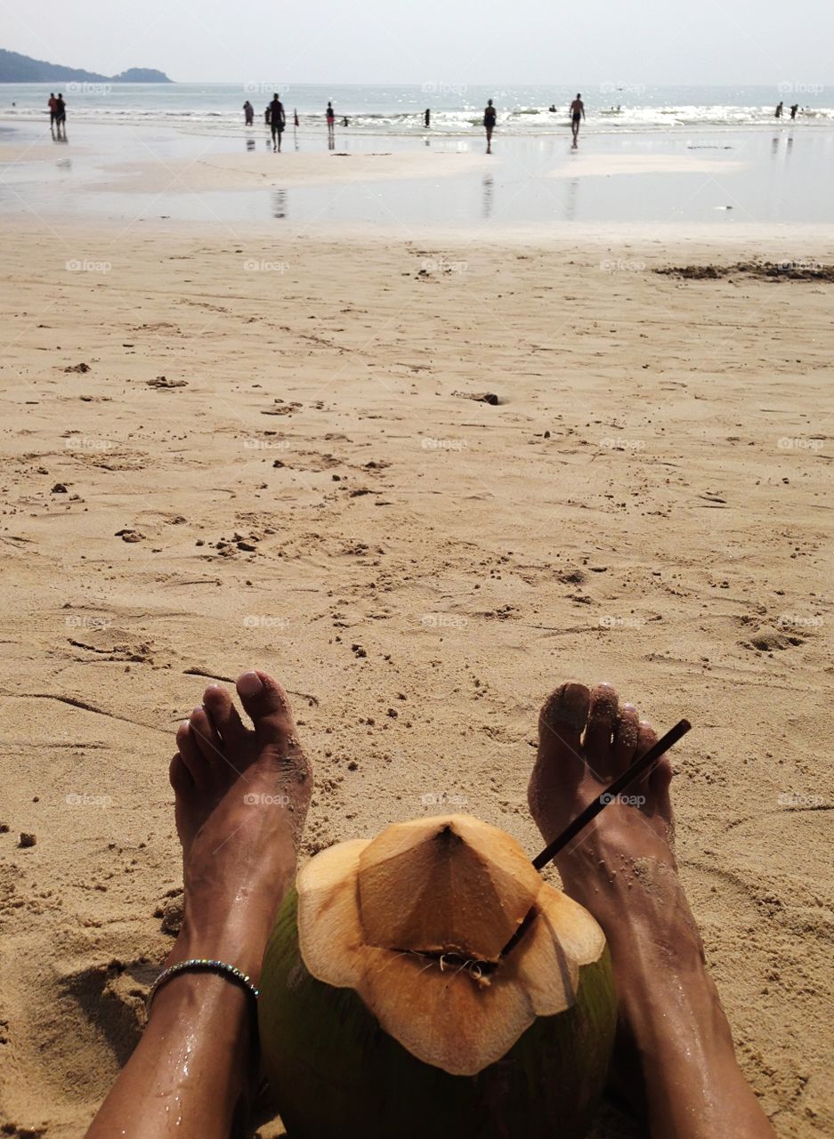 Coconut cocktail at the beach 