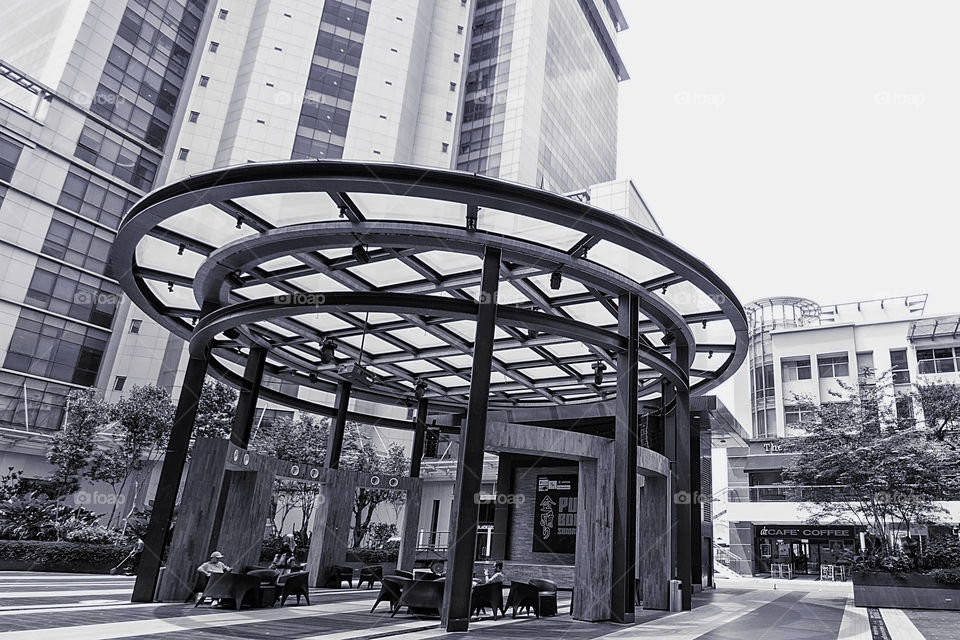 People sitting in lounge near building