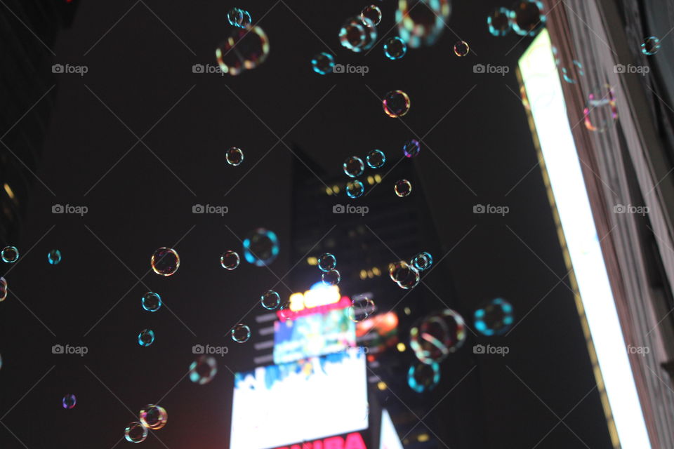 Bubbles partying it up in Times Square 