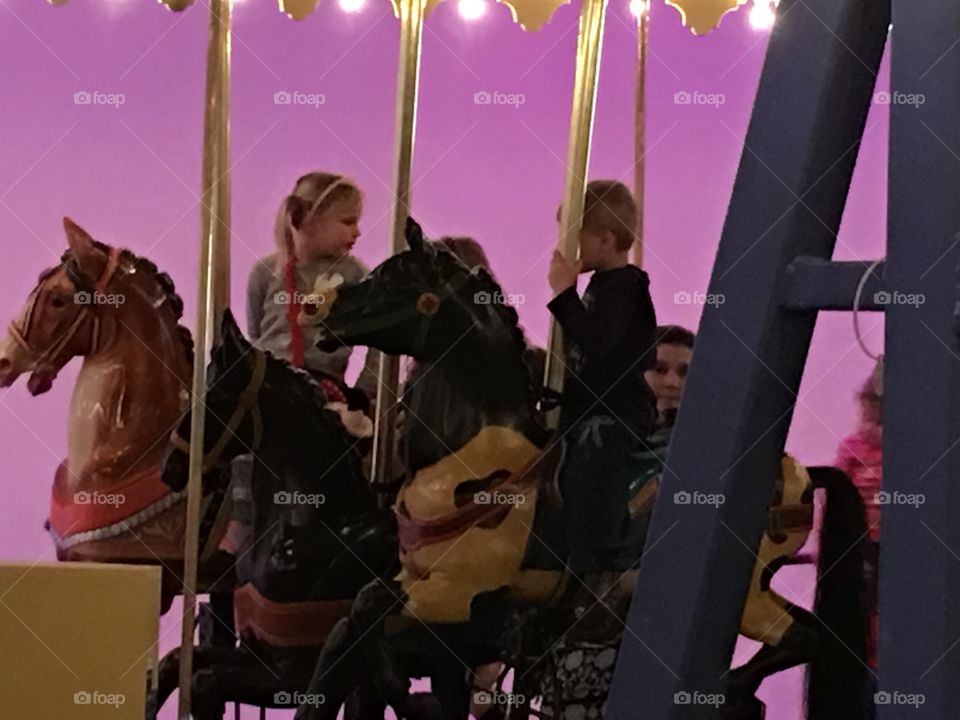 Young love on carousel 