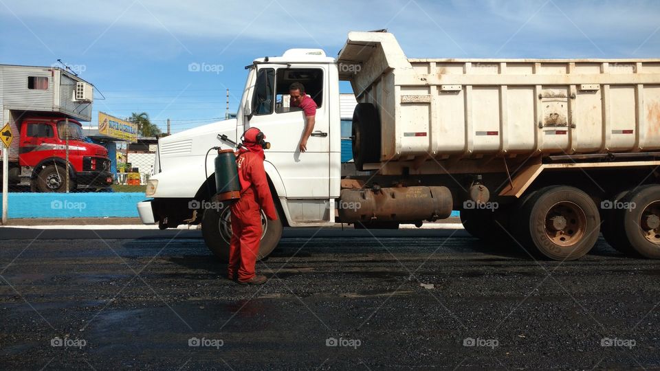 Comunicação de Homens e, caminhões de fundo.