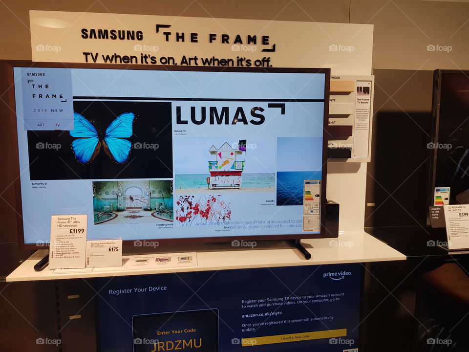 Samsung The Frame Art mode TV installation at Peter Jones Sloane square Chelsea King's road London displaying customizable bezels and Lumas