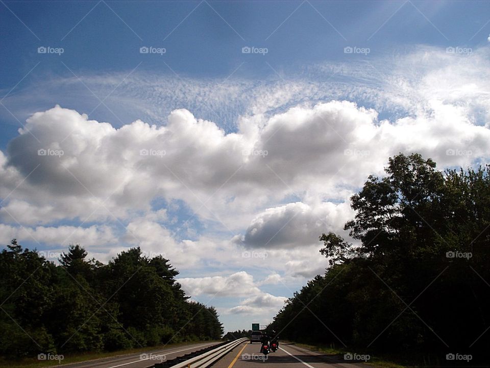 CLOUDS OVER HIGHWAY
