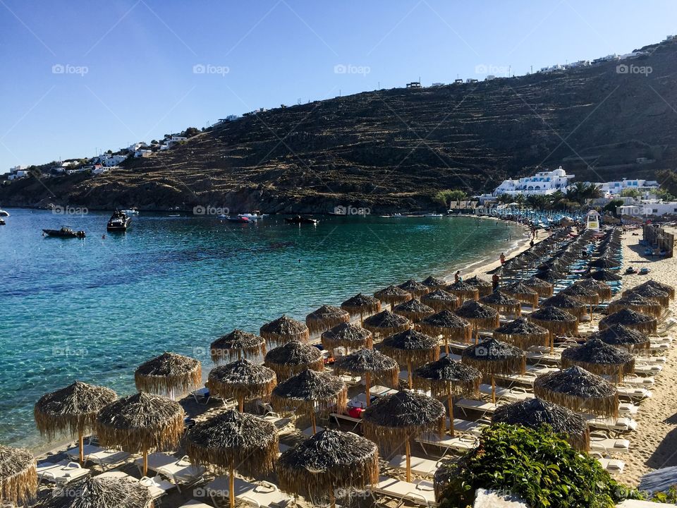 Beach side umbrellas in Mykonos 