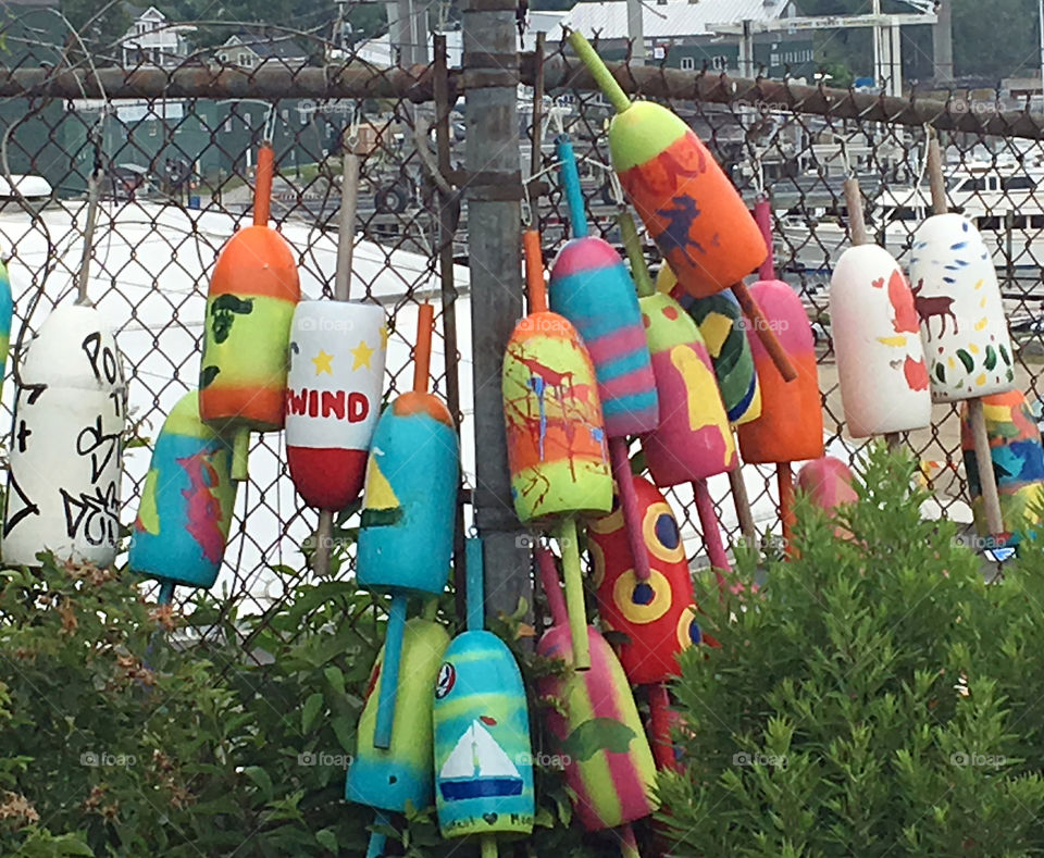 Buoys on a fence in Belfast Maine