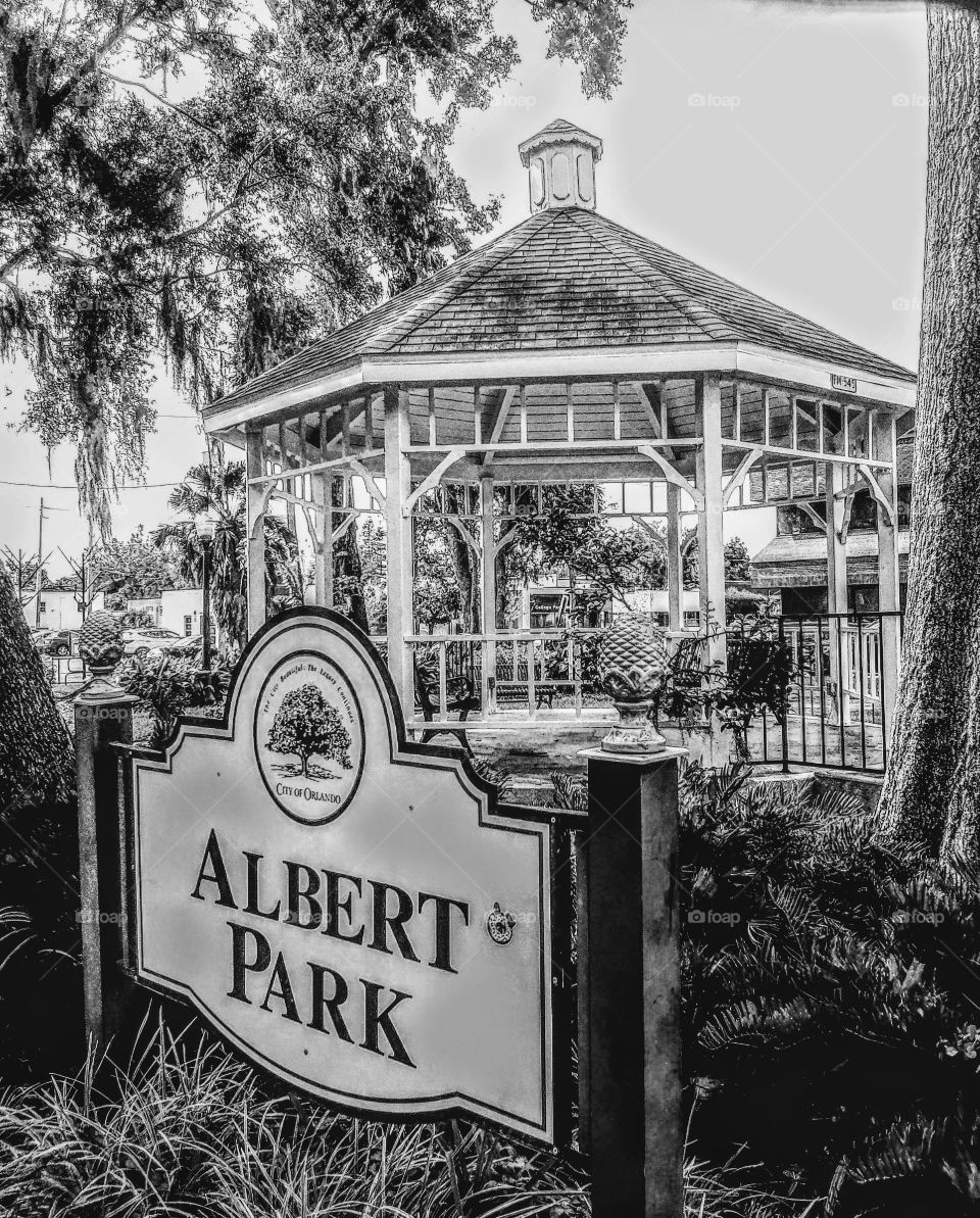 monochrome photo of park with gazebo