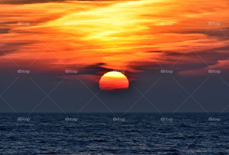 Bright sunrise over the baltic sea in gdynia, poland