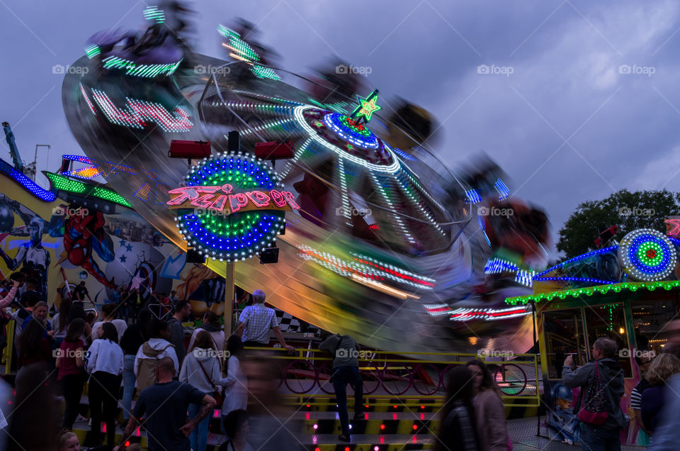 People having fun in an amusement park.